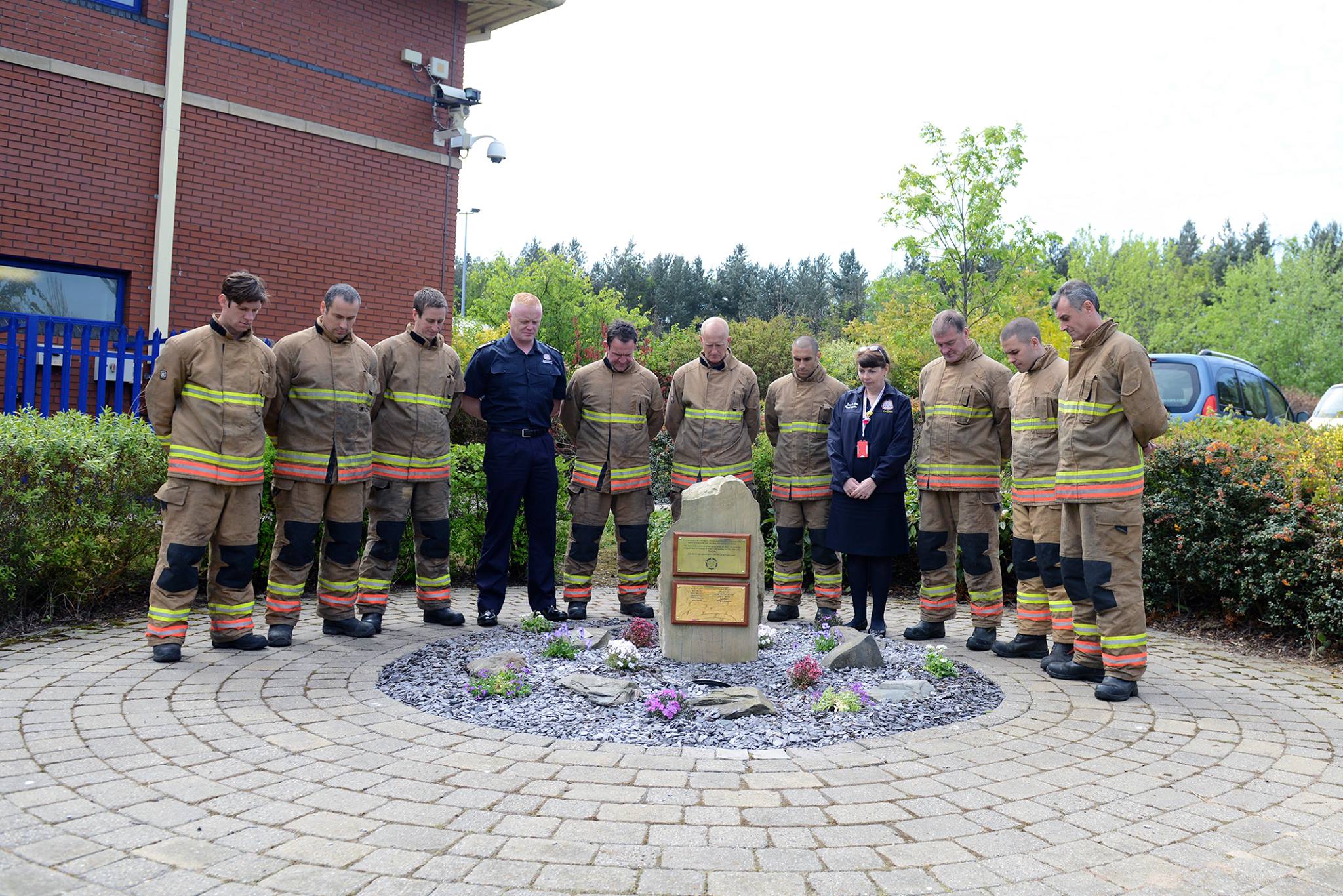 TWFRS firefighters during a minute's silence
