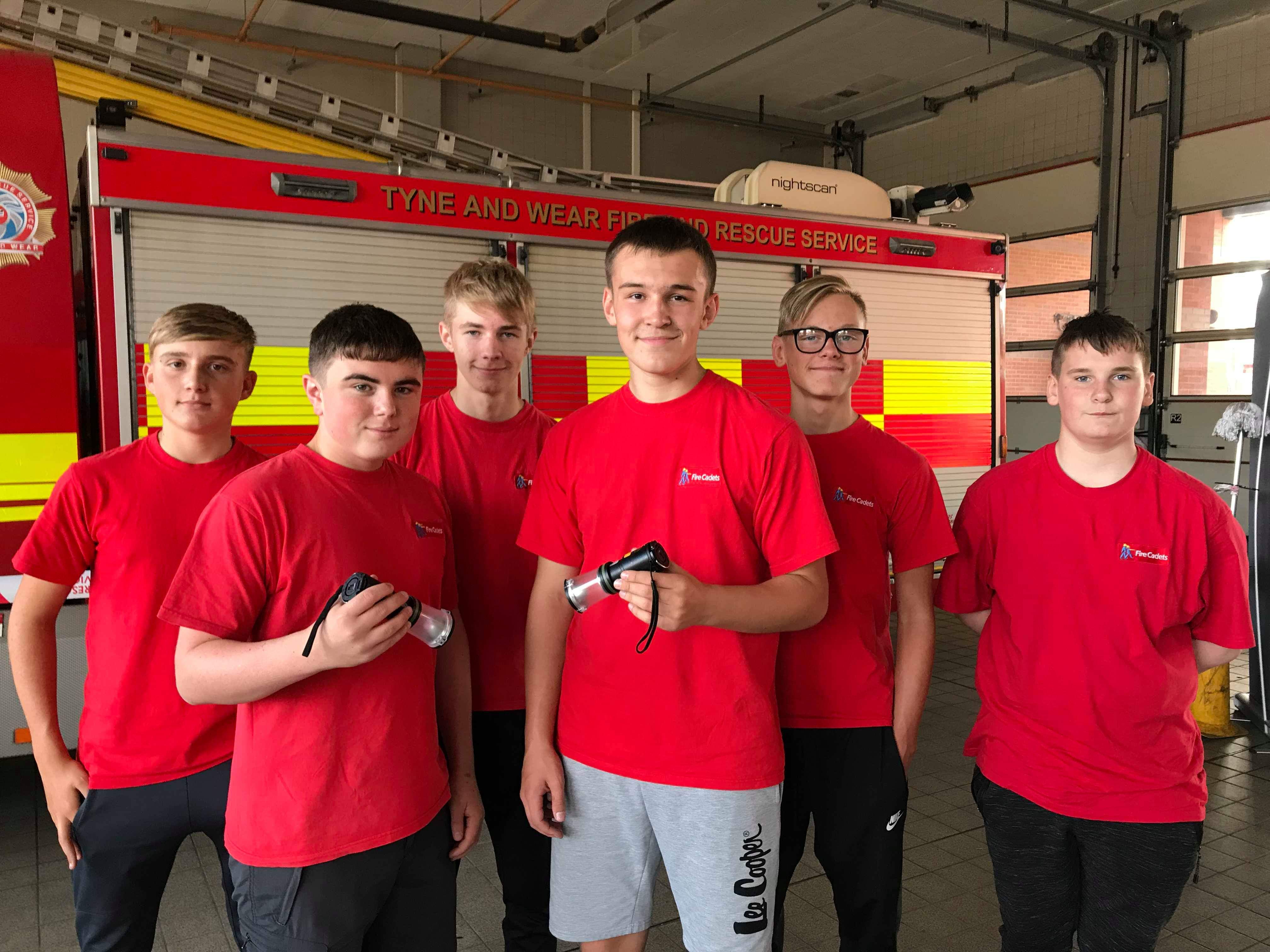 Fire cadets with torches