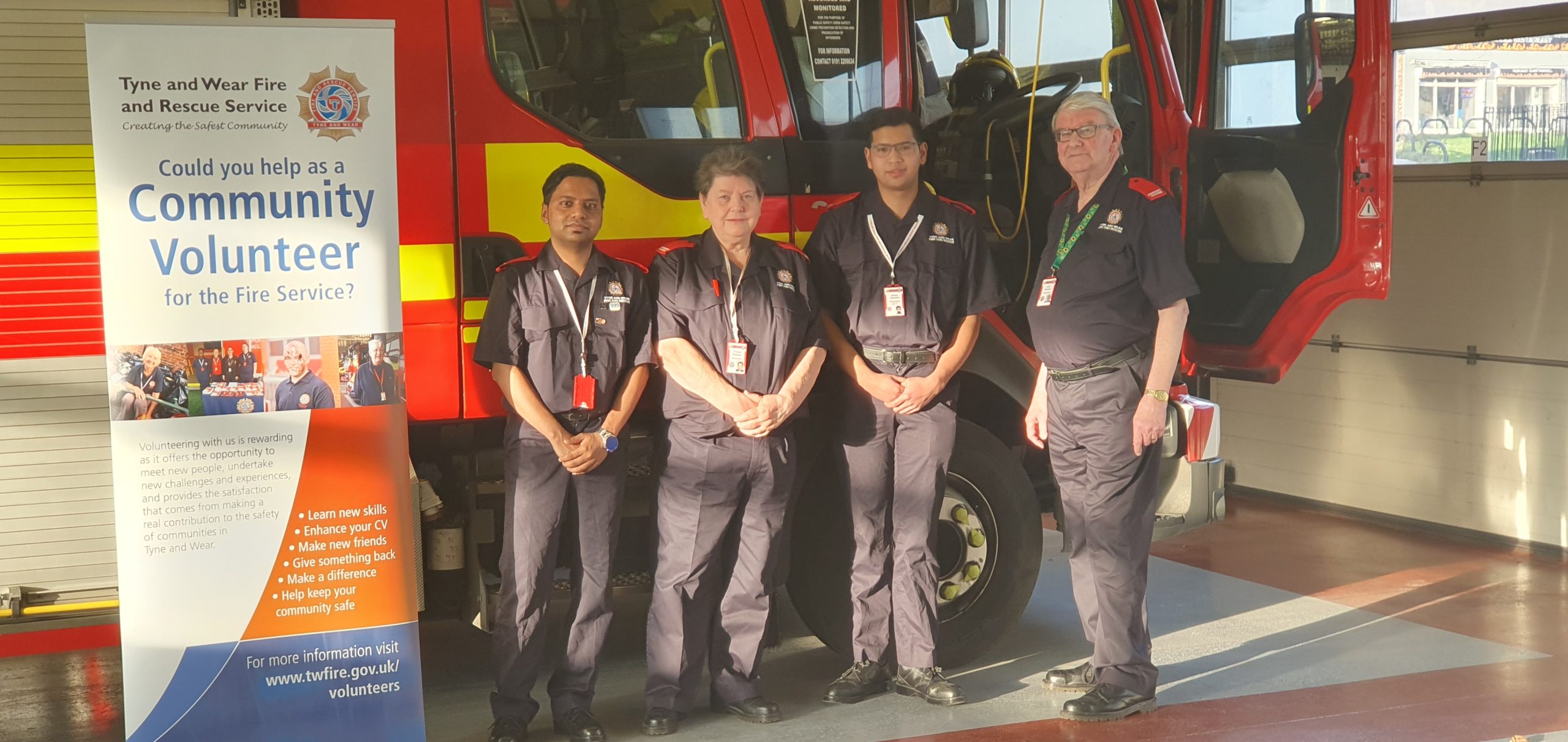 Volunteers with a fire engine