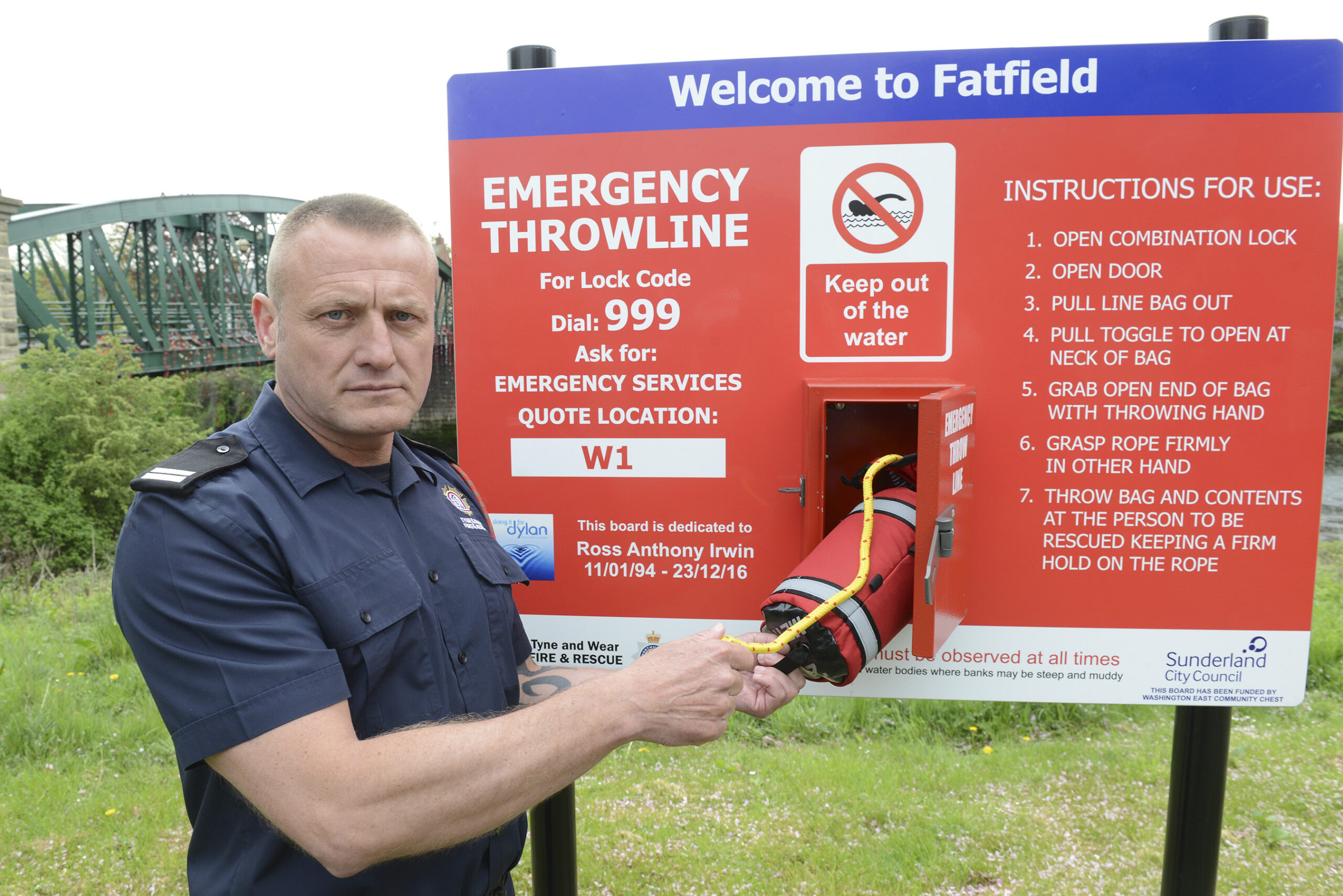 Crew Manager Dave Irwin of Tyne & Wear FRS - holding a throw bag at Fatfield along the River Wear.