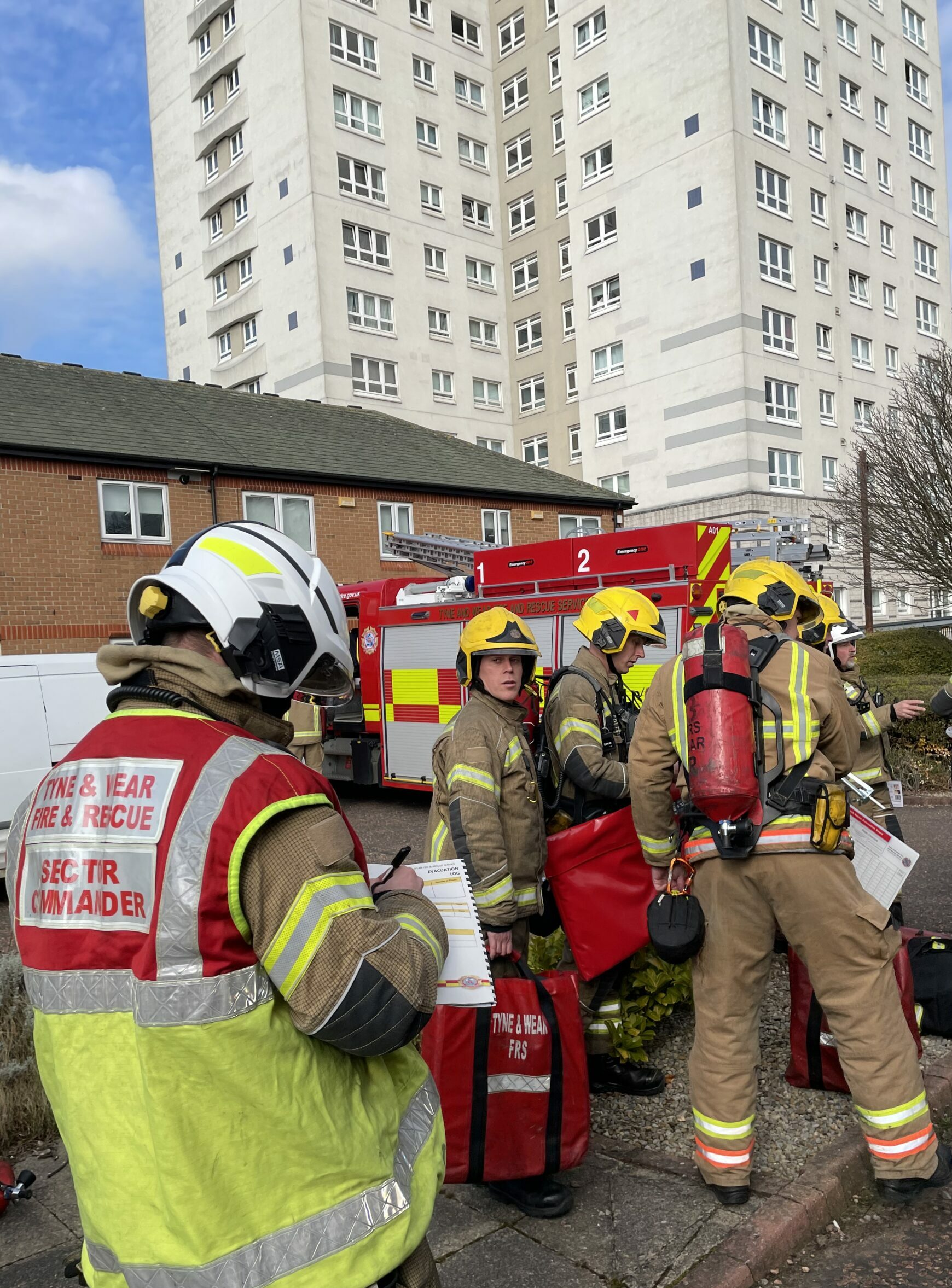 TWFRS firefighters during an evacuation exercise at Amble Tower in Sunderland. 