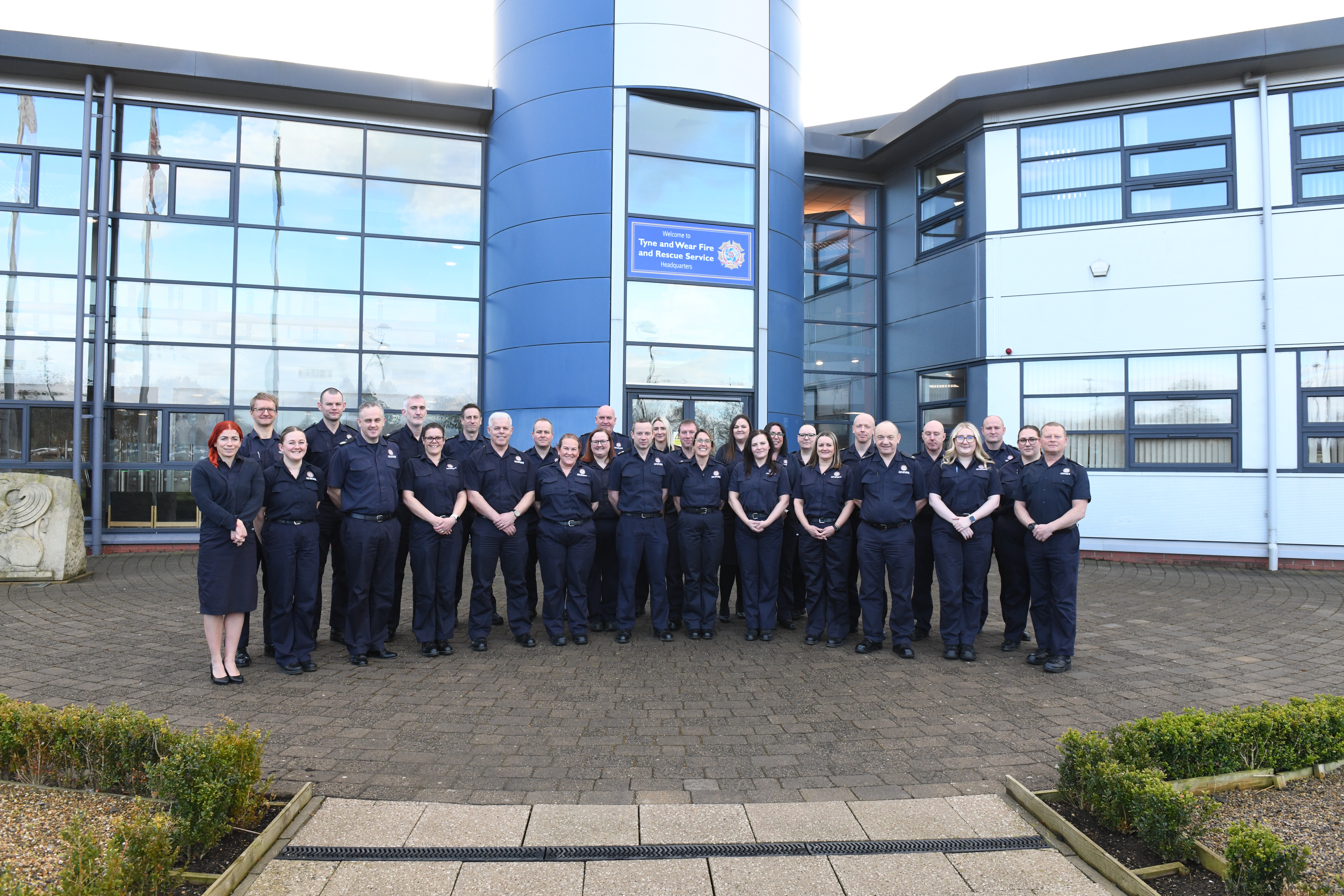 Fire Safety Department stood outside Tyne and Wear Fire and Rescue Service's Head Office.